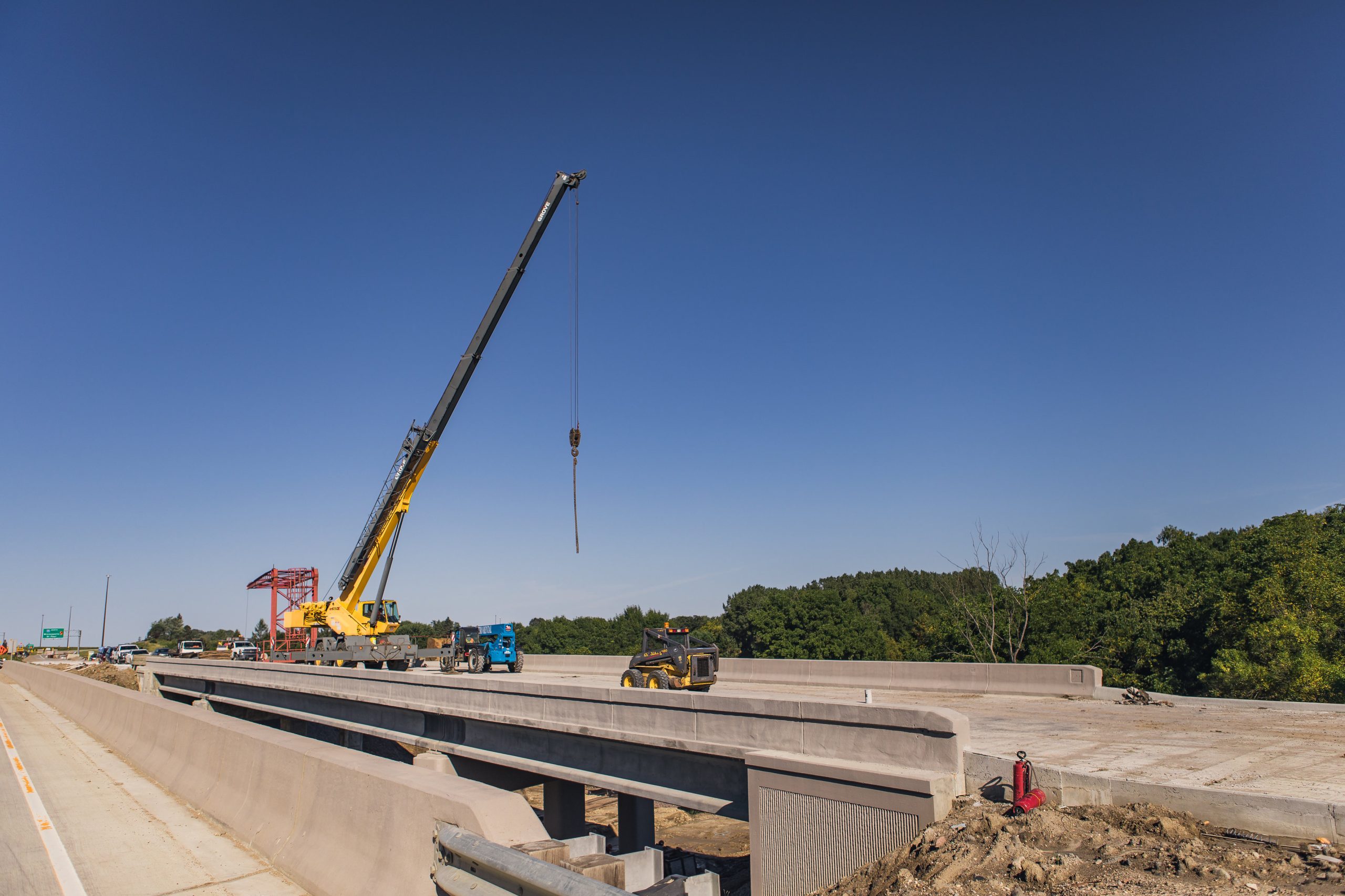 crane on roadway doing construction