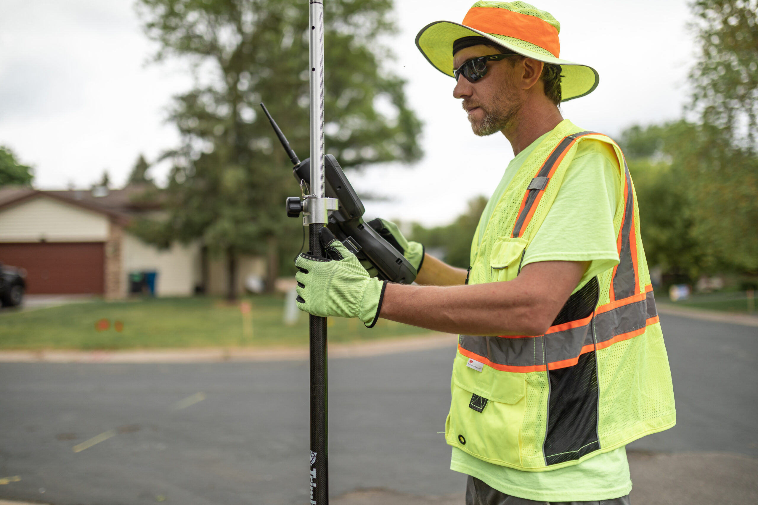 Survey crew using survey equipment