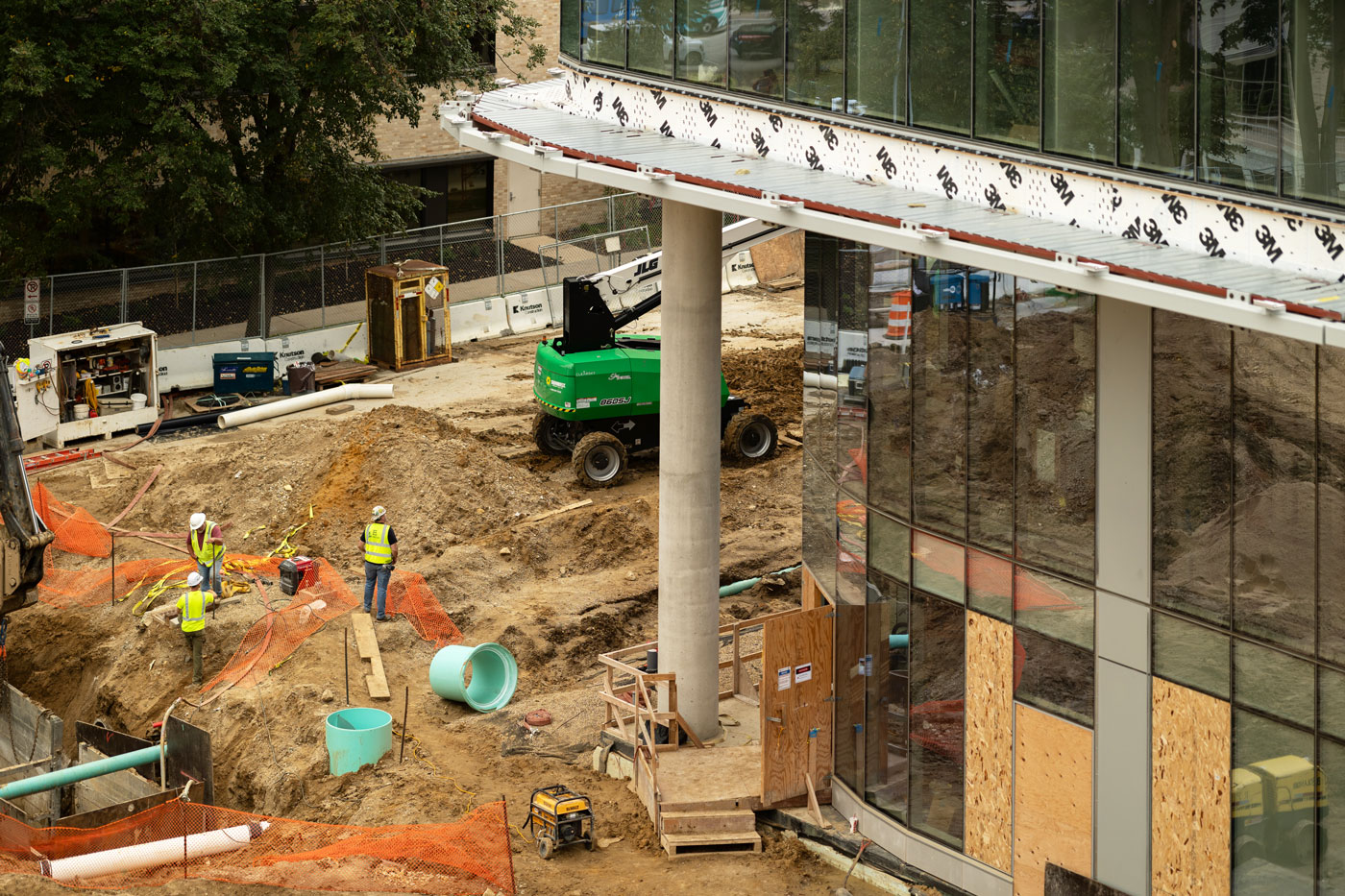 Engineers inspecting the construction of a commercial building.