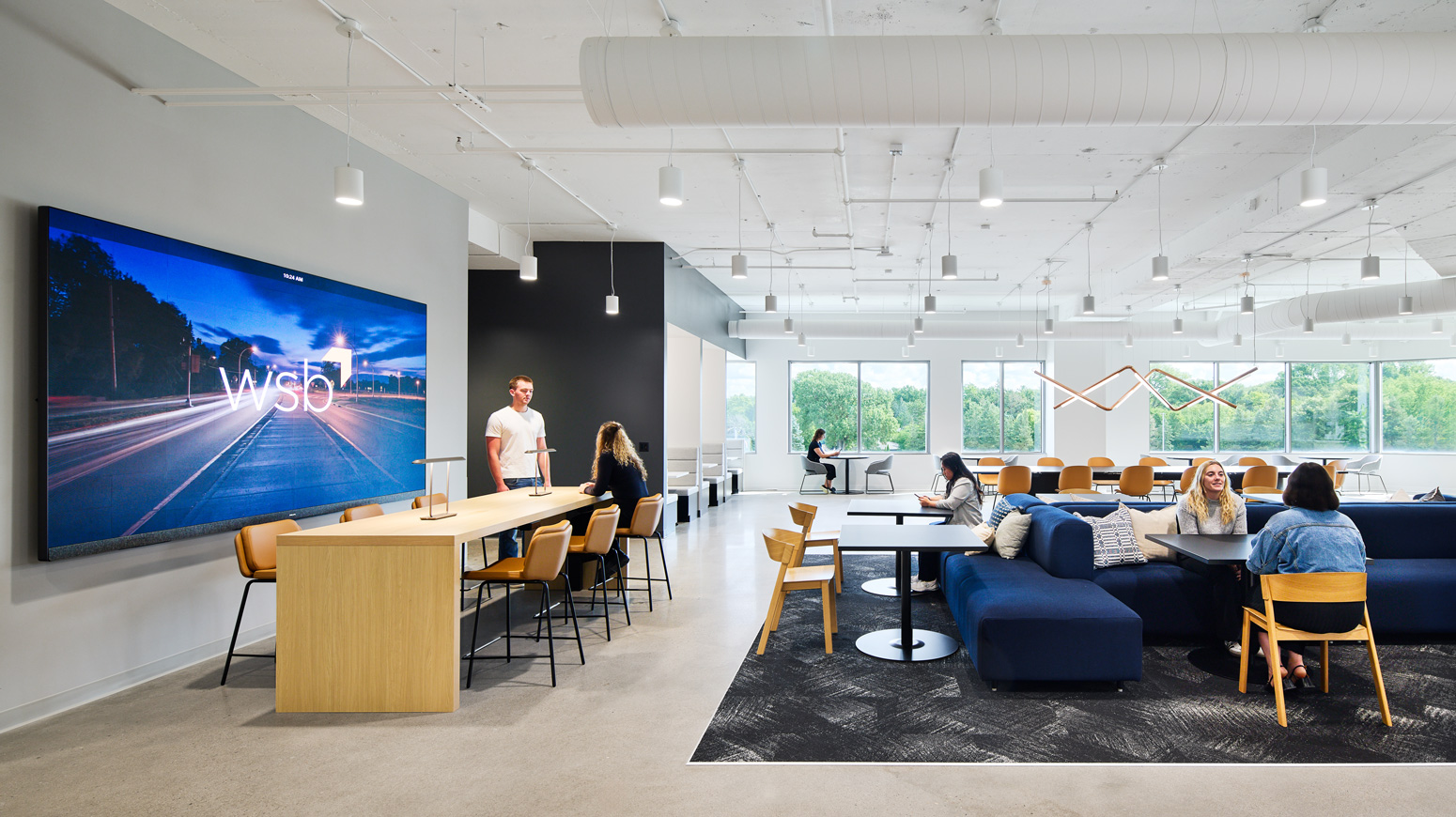 WSB Staff working in the lobby of the WSB headquarters.