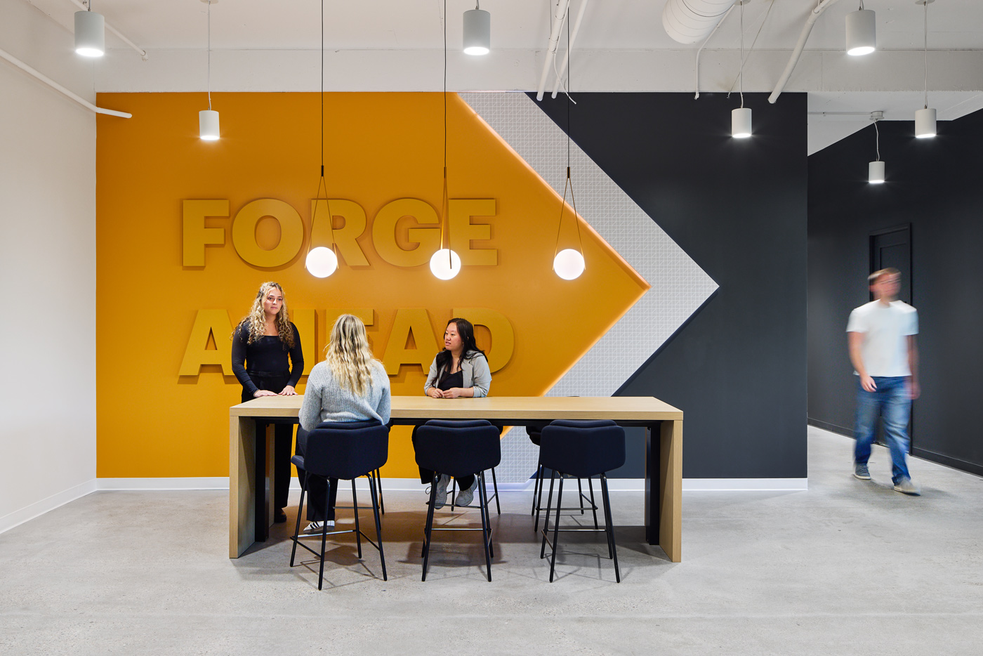 WSB staff working at a table in the WSB office.