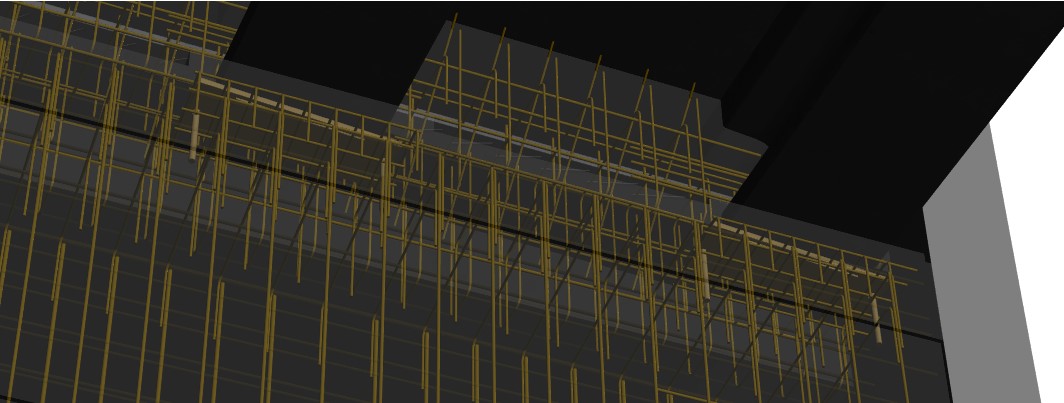 3D model of a concrete structure viewed from below, showing a dense grid of yellow vertical and horizontal reinforcing bars (rebar) within a dark concrete element. The rebar is arranged around a stepped or offset slab or beam transition, highlighting reinforcement congestion and detailing.