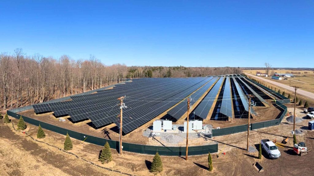 Aerial view of the 3.6 MW Constable Solar agrivoltaic ground‑mount solar array in Constable, New York, showing rows of panels and site infrastructure.