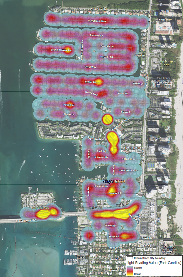 GIS map showing a light reading heat map of Singer Island and surrounding areas, with color gradients representing foot‑candle values over an aerial basemap and the Riviera Beach city boundary labeled.